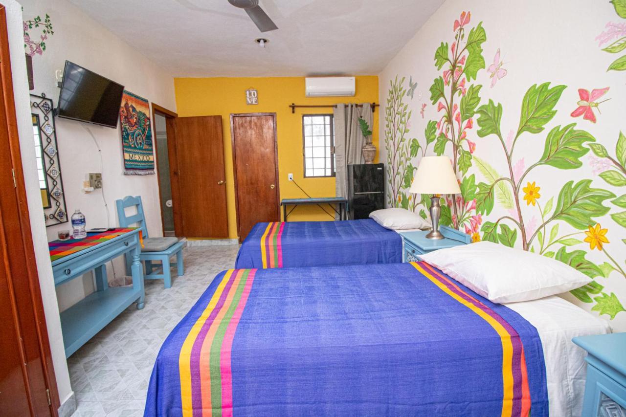 Hotel La Casa Del Almendro à Playa del Carmen Extérieur photo
